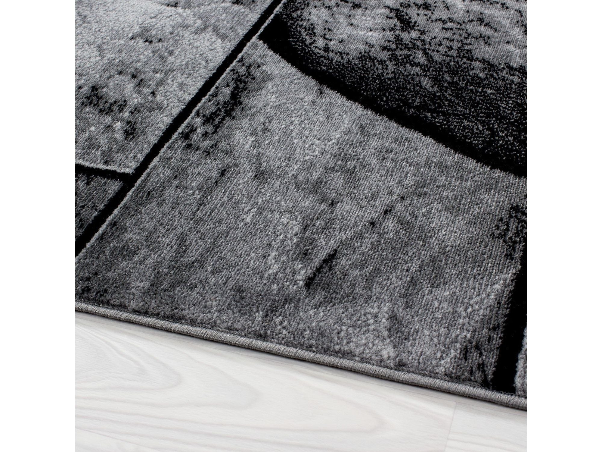 Moderner Designer Wohnzimmer Teppich mit Steinmotiv PARMA 9250 Schwarz-Grau